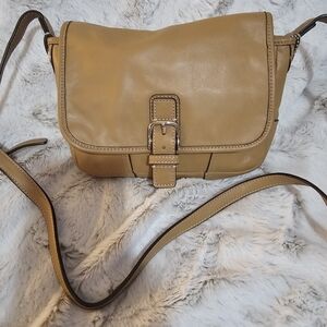 Coach crossbody with flap.